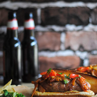 Grilled Sausage Sandwiches with Onion Sauce and Grilled Red Pepper Relish