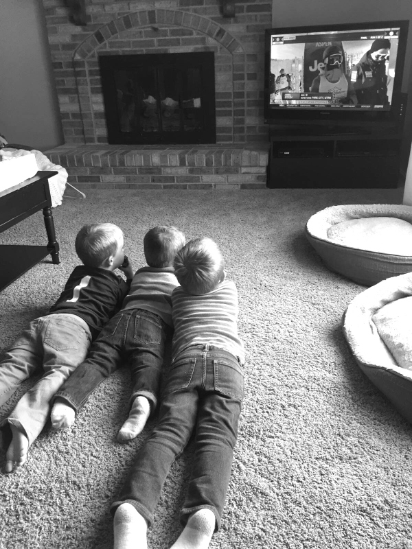 Watching TV with his cousins