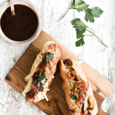 Grilled Hot Dogs with Bacon, Caramelized Onions, and Spicy Mustard Sauce